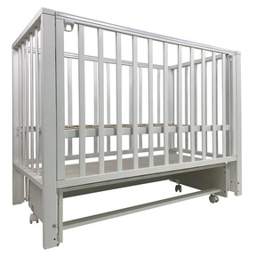 Детская кровать Indigo Norden с маятником и колесами 